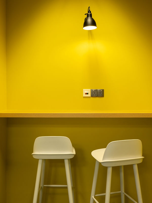 Nutanix yellow workspace design by Space Matrix