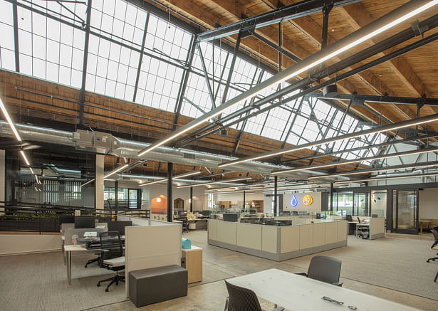 The transformation of an old spark plug factory into a bright and modern office space stands as a testament to the power of restoration and innovation.