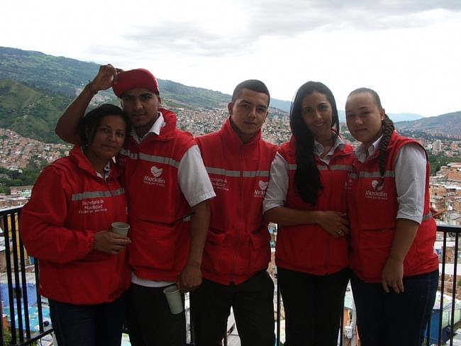 A security team of 15 young men and women from the neighborhood patrol the escalators. They wear red jackets and know everybody. (Letty Reimerink)