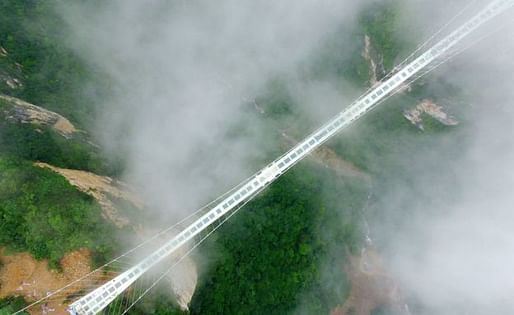 Overwhelmed by the unexpected number of visitors, the Zhangjiajie Grand Canyon glass bridge needs a little...break. (Image via bbr.com)