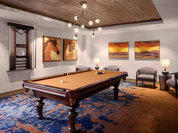 Carpet patterns and artwork in the billiards room showcase elements of indigenous flavors inspired by Tucson’s cultural melting pot. (photo by Will Pryce)