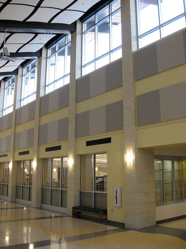 Main corridor linking student classroom wings and entrance.