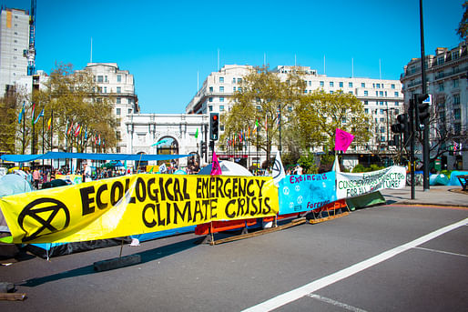 Extinction Rebellion protesters demonstrating for climate action at an April 20th, 2019 rally in London. Image courtesy Wikimedia Commons user Alexander Savin. (CC BY 2.0)