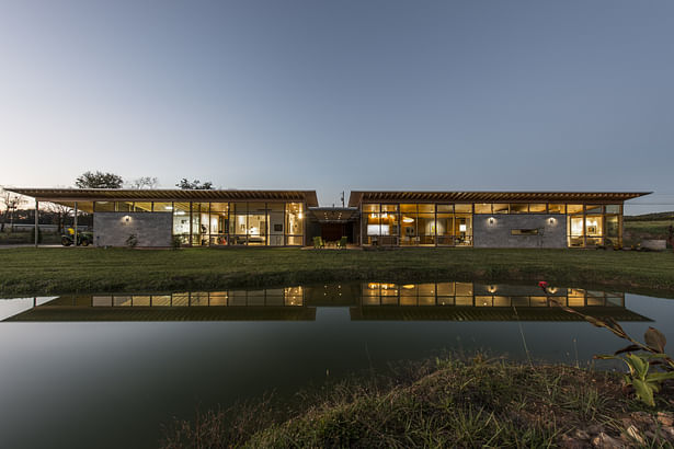 Inchyra is comprised of two wings separated by a dog trot entry. The wing to the right is general living space. To the left: guest room exercise, shop and garage. This facade faces south toward a national forest. An aquaculture pond is in the foreground. photo: Fredrik Brauer Fredrik Brauer