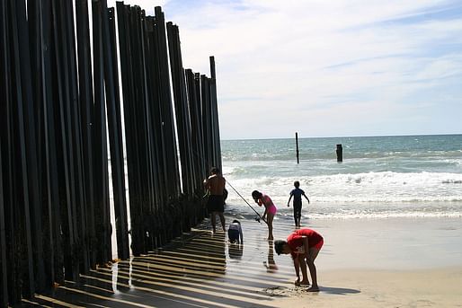 The US-Mexico border fence in California. Image via wikimedia.org