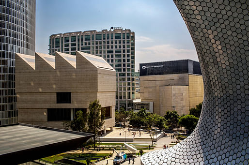 A view of the Museo Jumex from the Museo Soumaya. Credit Adriana Zehbrauskas for The New York Times