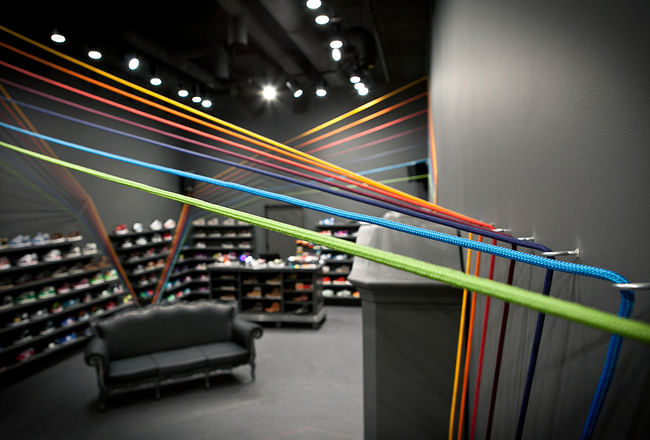 Run Colors sneaker shop in Poznań, Poland by mode:lina architekci; Photo: Marcin Ratajczak