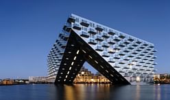 BIG and Barcode complete cantilevering residential building on Amsterdam waterfront