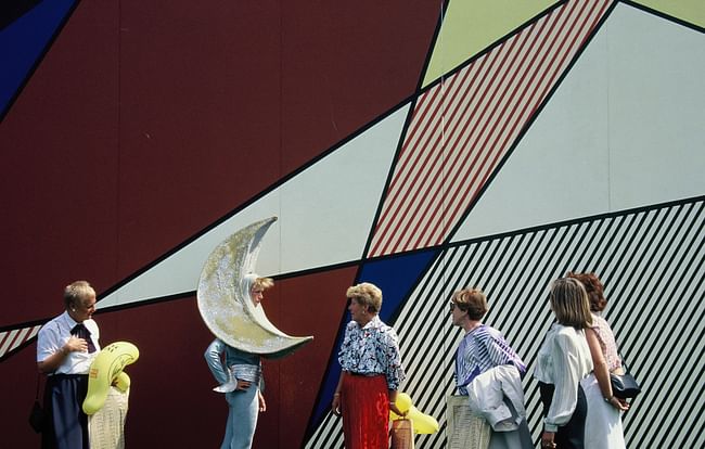 Archived Image: Performer in front of Roy Lichtenstein's Luna Luna Pavilion. Luna Luna, Hamburg, Germany, 1987. © Estate of Roy Lichtenstein, 1987, all rights reserved. Photo © Sabina Sarnitz. Courtesy of Luna Luna, LLC.