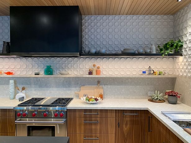 Rich textures in the kitchen balance beautifully the modernist language of the Corner House.