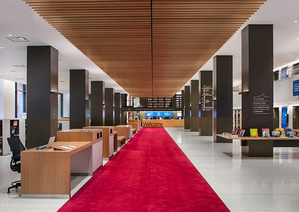 SNFL’s ground floor is arranged around an internal street that runs beneath a floating linear canopy of wood beams, from the Fifth Avenue entrance to the welcome desks. Image copyright by John Bartelstone