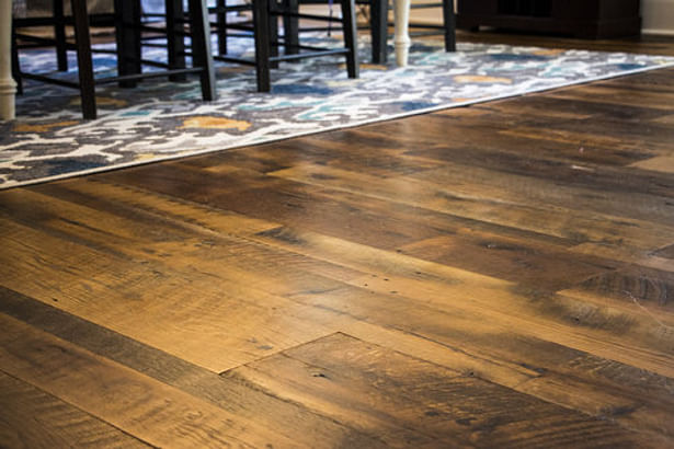 Heartland Barnwood Skip Planed Flooring in Lexington, Kentucky. Visit https://www.oldworldtimber.com/.