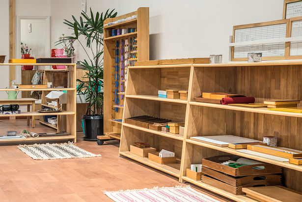 Learning material shelves easily accessible to children