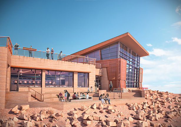 The building is clad in a material similar to Pikes Peak granite to blend into the mountain. Nestled into the mountain, visitor exposure to the harsh winds atop the peak is minimized. Credit: GWWO/RTA