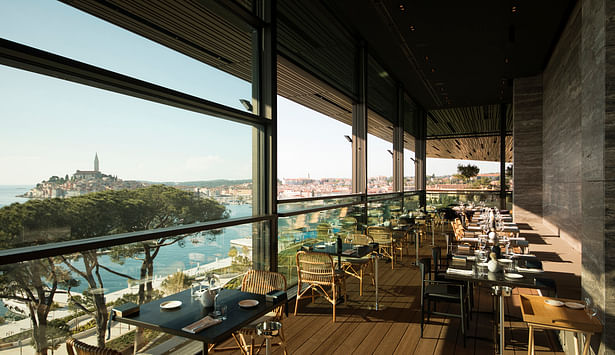 A bar with a terrace and an a la carte restaurant with the view of the city