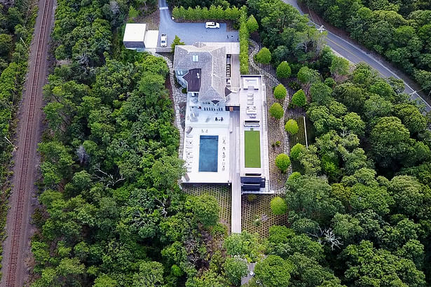 Aerial Drone Shot of Main House, Existing Pool Deck, and Prefab Guest Wing Addition