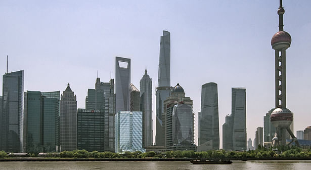 The Foxconn Headquarters stands modestly in character amongst a handful of giant skyscrapers along the Huangpu River.