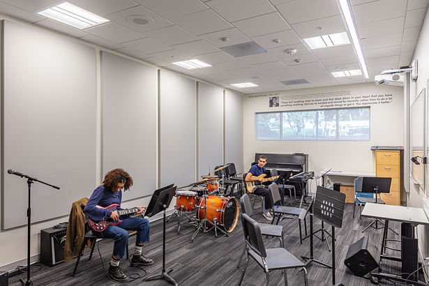 A view of a jazz classroom adjacent to the lounge space, featuring natural light and high performance acoustics.