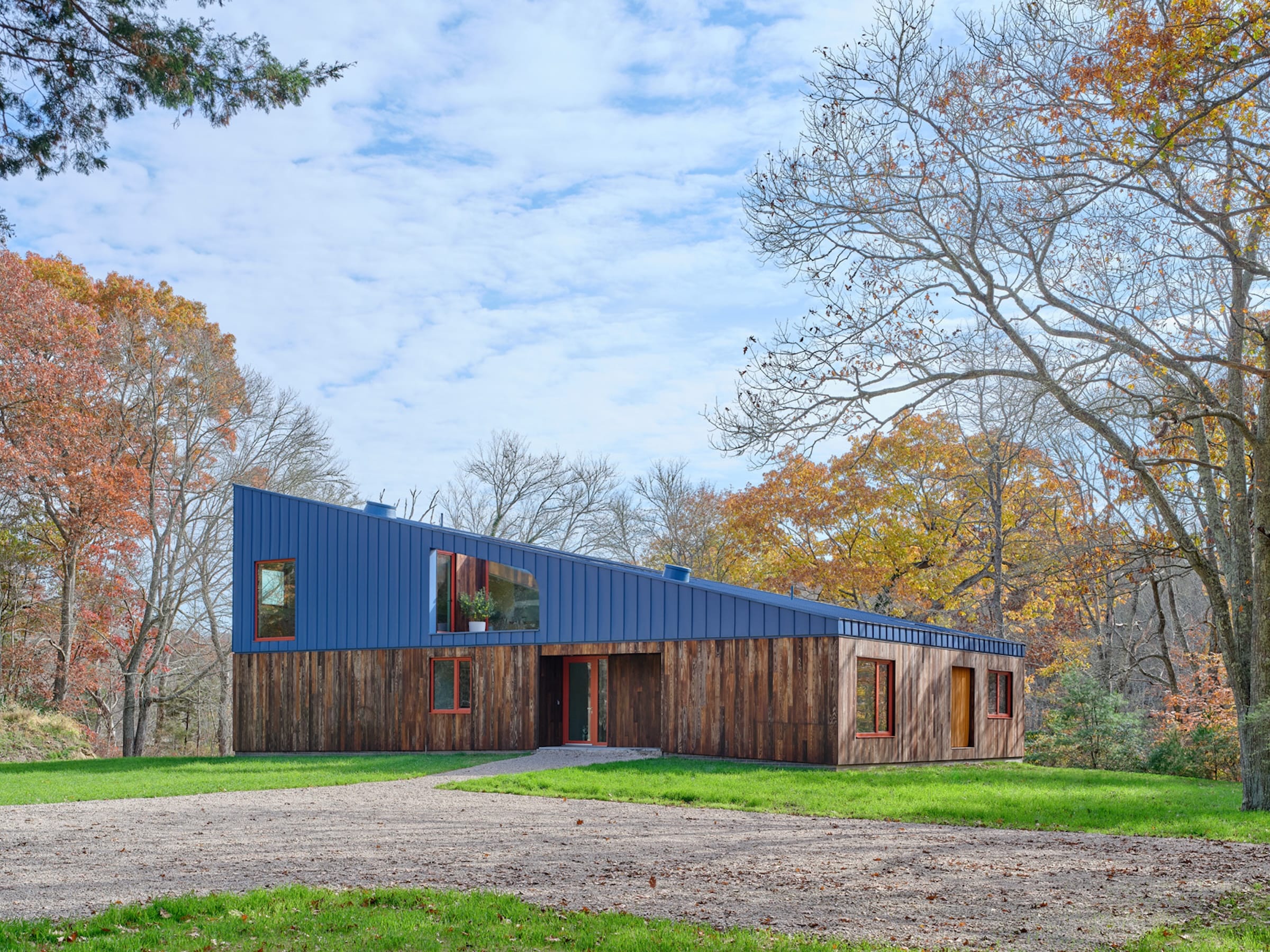 WORKac completes Rhode Island house with blue aluminium roof