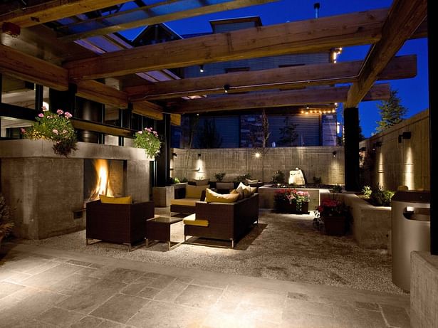 Outside seating area complimented with fireplace and comfortable seating