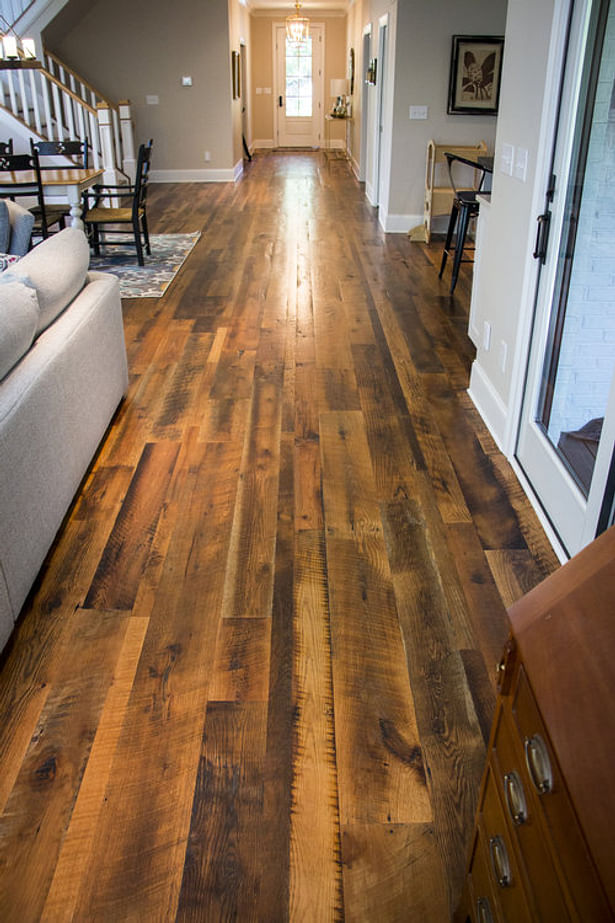 Heartland Barnwood Skip Planed Flooring in Lexington, Kentucky. Visit https://www.oldworldtimber.com/.