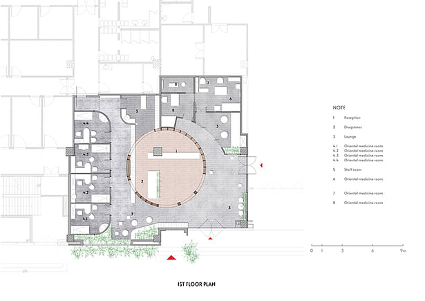 The ground floor plan highlighting the terracotta tile flooring, the intricate wooden cabinet module surrounding it and natural stone flooring in rest of the spaces. 