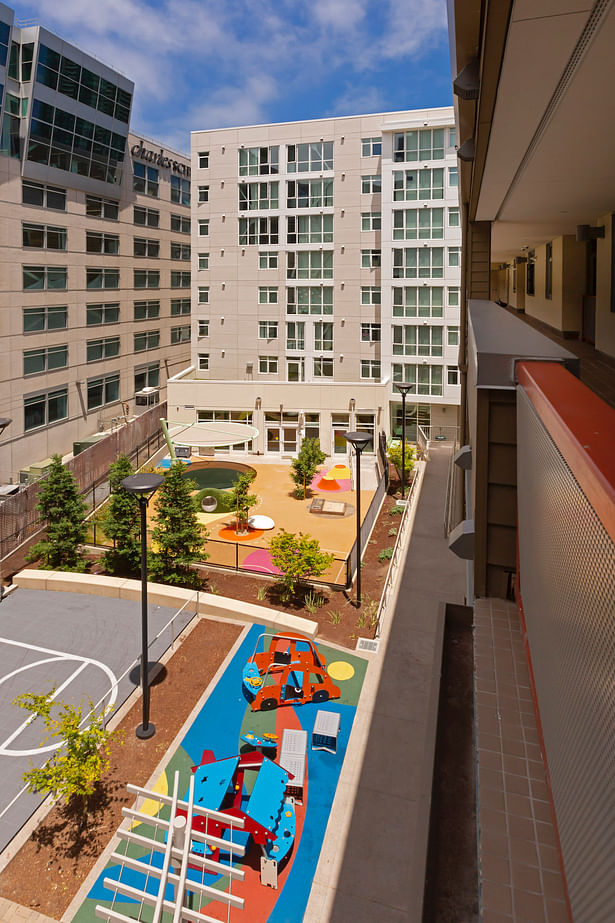 An mid-block courtyard provides a place for kids to play and families to gather. Photo © Michael O'Callahan