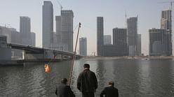 China’s replica of Wall Street is full of half-built, deserted skyscrapers and floods regularly