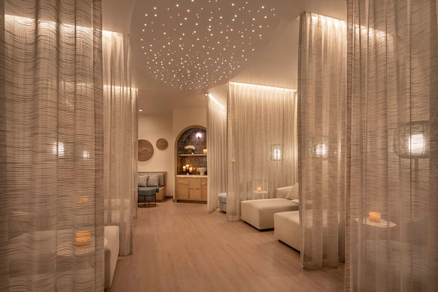 In the co-ed relaxation room, a custom light fixture with small organic cutouts in laser-cut metal creates dappled light, alluding to starry nights over the canyons. (courtesy The Westin Kierland Resort & Spa)