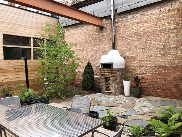 Courtyard with custom pizza oven Carmen Troesser Photography