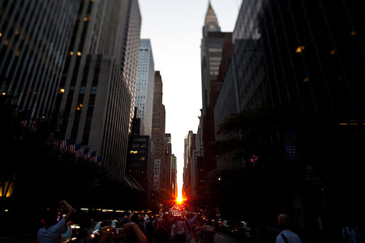 View of “Manhattanhenge” at 42nd St. and 2nd Ave. Photo: Geoff Stearns/Flickr.