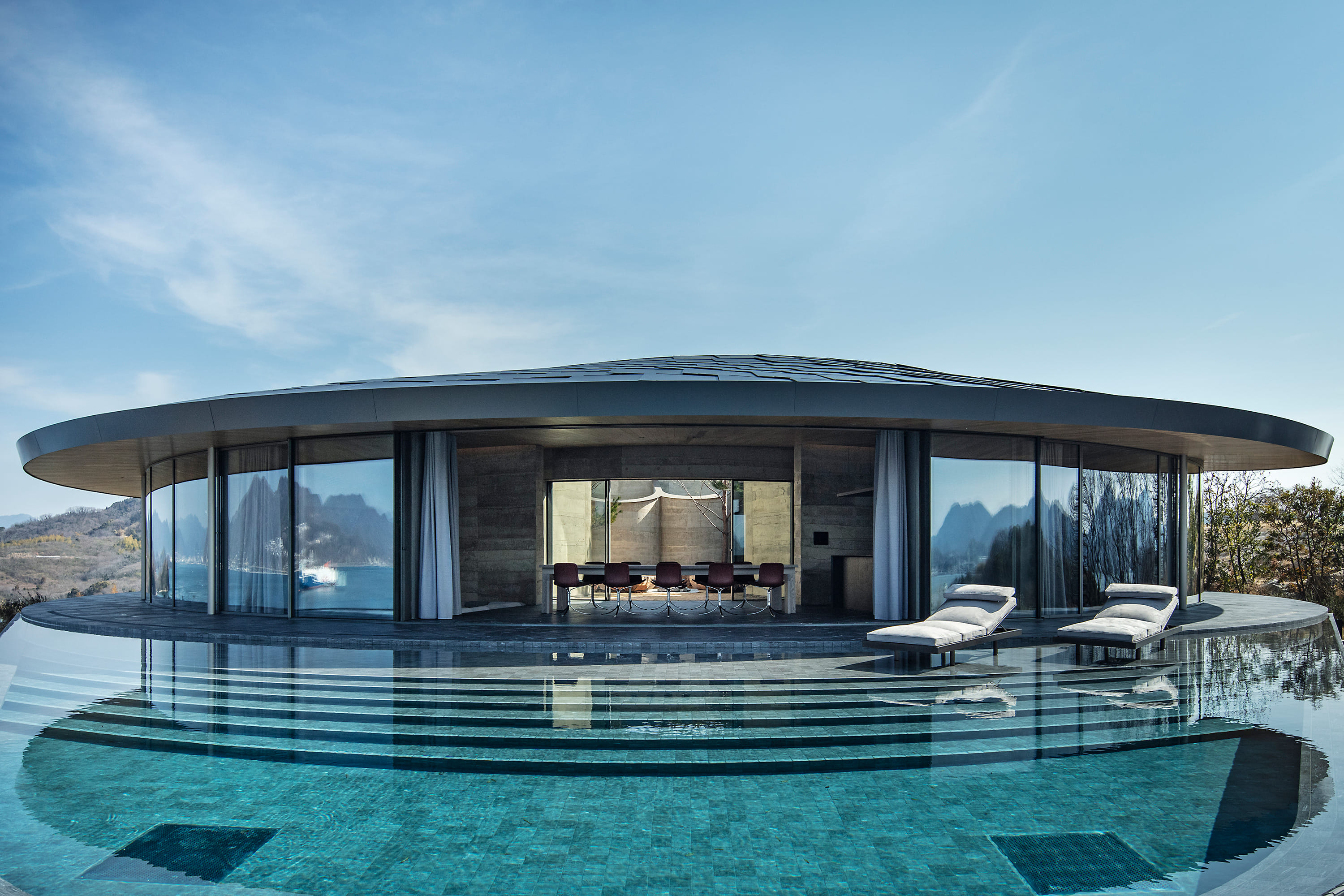 Island vistas and rammed earth star in BIG's Japanese NOT A HOTEL