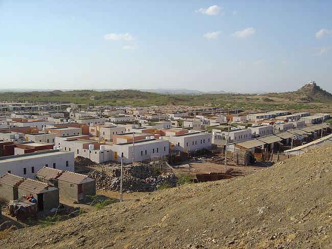 The Sardar Nagar relocation site for impoverished earthquake-affected families of Bhuj. The master plan includes 1200 homes, three schools, and productive farms. Credit: Hunnarshala.