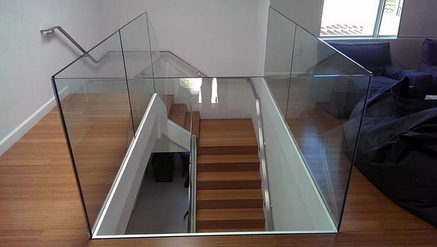 Featuring Glass Railings & Second Floor Guardrails, and a Stainless Steel Flat-bar Handrail