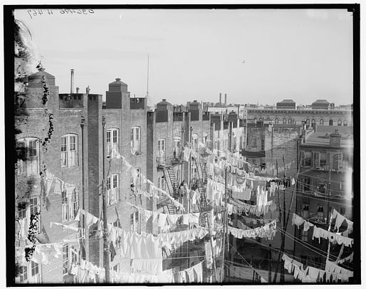 Housing like this New York City tenement, photographed at the turn of the century, often didn't provide proper ventilation or access to sunlight for the residents health. Image via Wikipedia.