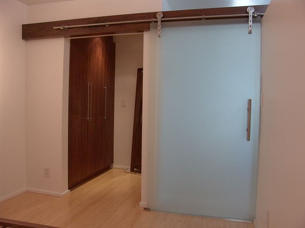 Closet remodel with sliding glass door
