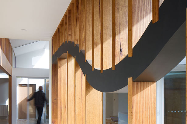 Curved Plywood Hallway Screen