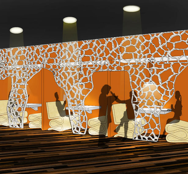 The library study booths, with their giraffe print partition wall and their cardboard chairs inspired by Gehry