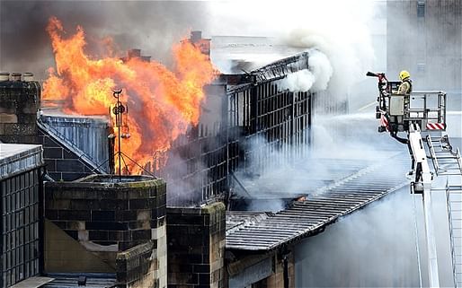  Firefighters tackle the blaze at the famous Glasgow School of Art. (The Telegraph; Photo: CRAIG WATSON/SNS)