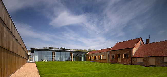 The rolling lawn with oak clad archive (Photo: Richard Bryant Photography)