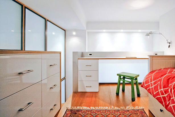 A Built-In Dresser and Desk Allows the Loft to Double as a Guest Bedroom and Homework Zone