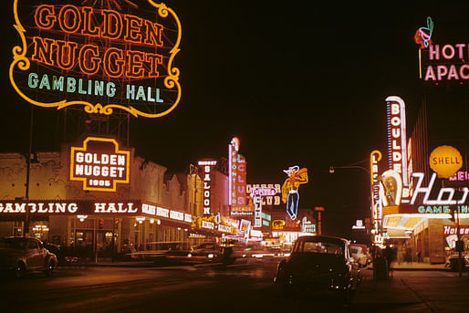 Fremont Street — at night in Downtown Las Vegas in 1952. With the former neon signs of the Golden Nugget Casino on the left, and neon Vegas Vic cowboy in distance. Image taken by Edward N. Edstrom. Courtesy of Gary B. Edstrom via Wiki Commons 