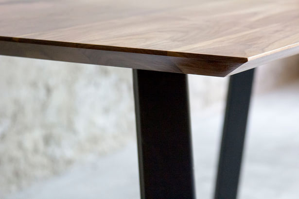 Conference table in walnut and steel legs fabricated by Synecdoche