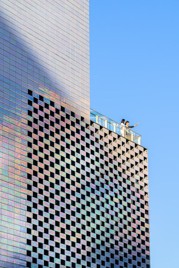 It also allowed MVRDV to include open-air terraces on each level, which are symbolically oriented towards landmarks such as the Forbidden City and Temple of Heaven—some visible from the building, others more distant—to root the building in its location. “We designed the KWG·M·CUBE so that the building continuously displays new patterns and colours. Depending on the weather and light conditions and where you stand, the façade might look subtly grey, or it might shine with all the...