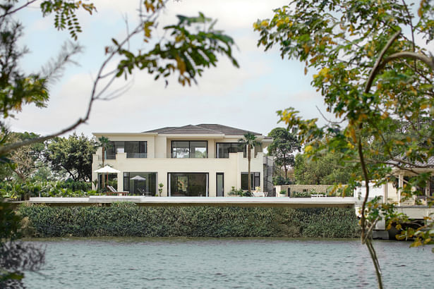 View of the villa from across the lake