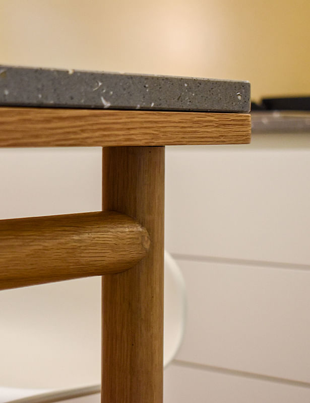 bespoke kitchen table, with quartz top and honey oak structure