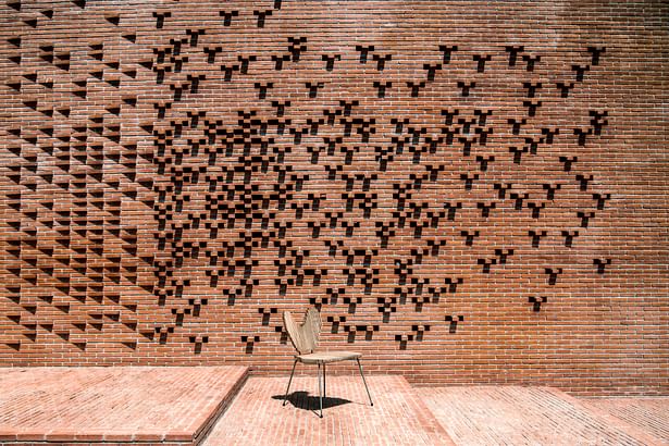 Brick walls designed to breathable and let the flesh air flow into the building.