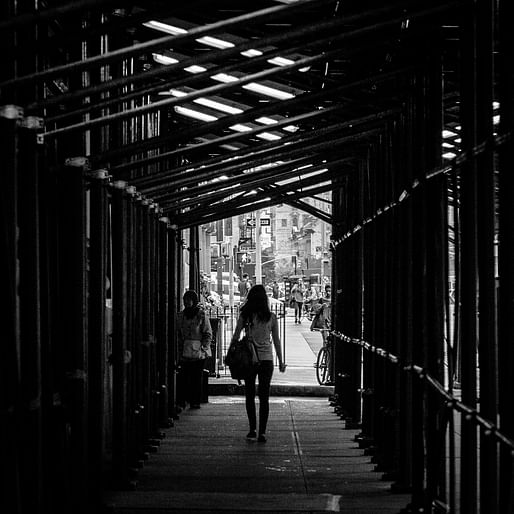 More than 9,000 sidewalk sheds (over 300 miles if put together) currently define the streetscape of NYC — while also protecting pedestrians from falling, potentially deadly, debris. Photo: Billie Grace Ward/<a href="https://www.flickr.com/photos/wwward0/14196248854/in/photostream/">Flickr</a>