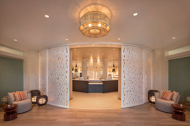 A full-height screening door system at the spa’s entry has laser-cut designs in patterns reminiscent of limestone carbonate rock forms. This screening motif is carried throughout the spa. (courtesy The Westin Kierland Resort & Spa)