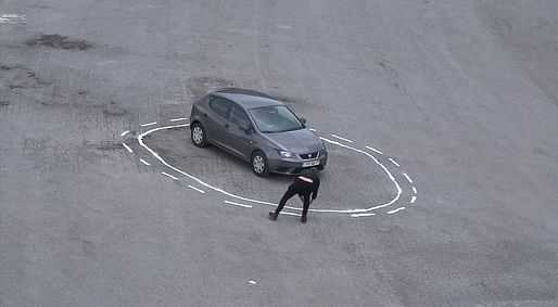 James Bridle entraps a self-driving car in a "magic" salt circle. Image: Still from Vimeo, "Autonomous Trap 001."